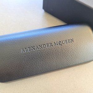 Black Alexandra McQueen sunglass case